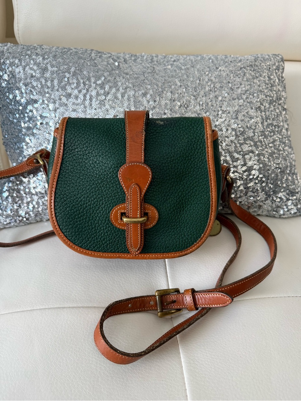 Vintage 1995 Dooney and Burke Green Pebbled Leather Saddle Bag with Brown Trim